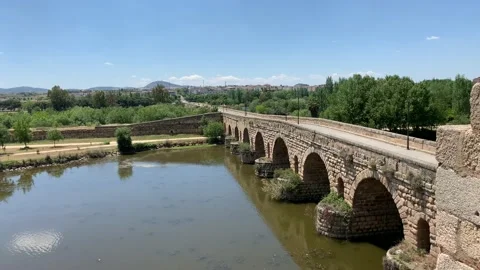 Roman bridge in Merida Spain on a clear blue day Stock Footage 107440893