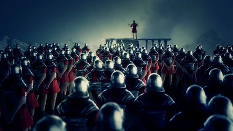 Roman Centurion Gives a Speech in Front of a Legion Under Rain Stock Footage 107983009