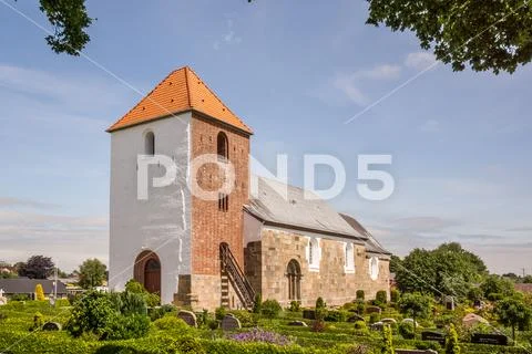 Roman church and graveyard in Denmark Stock Photos