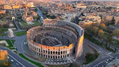 Roman Coliseum in the first rays of sun, aerial view of a famous Italian Stock Footage 187983570