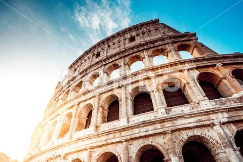 The Roman Colosseum at sunset Stock Photos