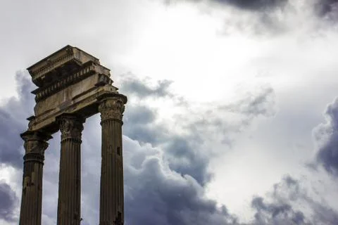 Roman columns with cloudy sky background Stock Photos