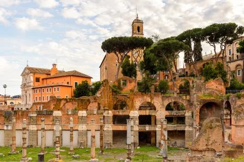 Roman Forum in the evening, a rectangular forum surrounded by the ruins of se Stock Photos