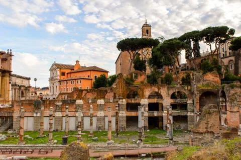 Roman Forum in the evening, a rectangular forum surrounded by the ruins of se Stock Photos