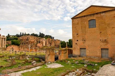 Roman Forum in the evening, a rectangular forum surrounded by the ruins of se Stock Photos