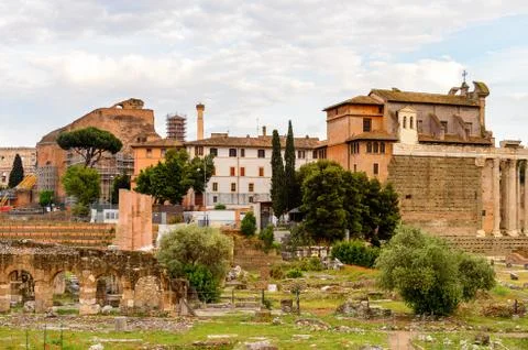 Roman Forum in the evening, a rectangular forum surrounded by the ruins of se Stock Photos