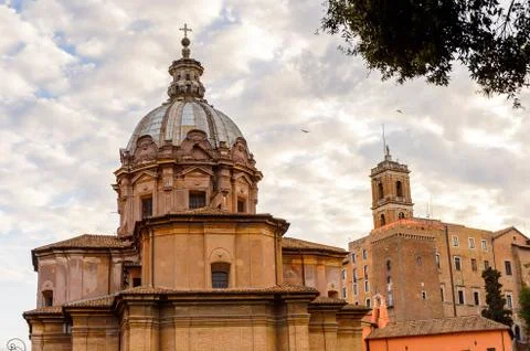 Roman Forum in the evening, a rectangular forum surrounded by the ruins of se Stock Photos