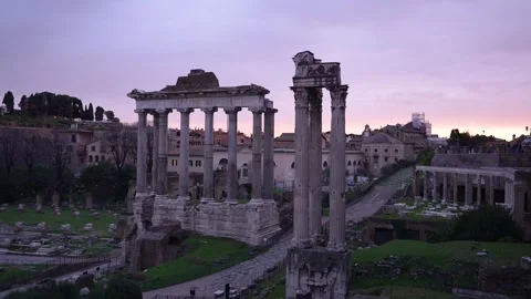 Roman Forum at Sunset. Pillars and Ancient Architecture in Rome, Italy. Pur.. Stock Footage 336511040