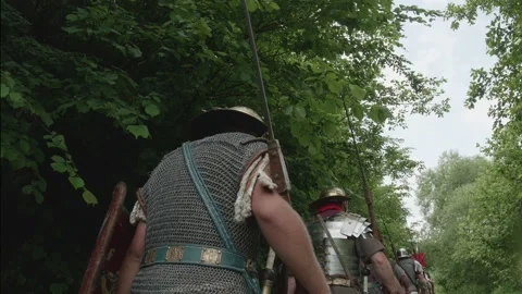 Roman legionaries marching through the forest to the camp on the limes, equi Stock Footage 148258528