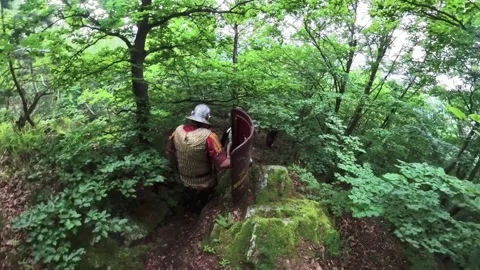 Roman legionnaires equipped for combat during a patrol mission Stock Footage 326311565
