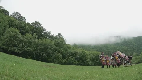 Roman legionnaires train with the weapons provided under the supervision of  Stock Footage 260117038