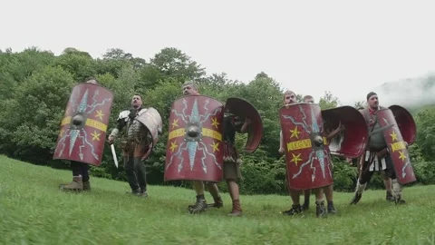 Roman legionnaires train with the weapons provided under the supervision of  Stock Footage 260117040