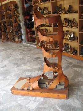 Roman sandals. Shoe shop in Greece Simi island Stock Photos