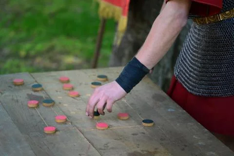 Roman soldier playing a game Stock Photos