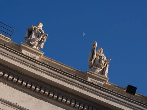 Roman statues with moon Stock Photos