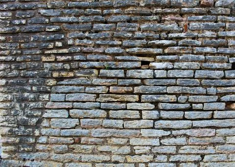 Roman Stone Elegance: Authentic Ancient Brick Texture Stock Photos