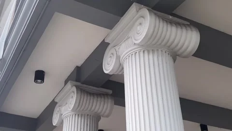 A roman style Doric columns in a modern style building. Video stock 260972750