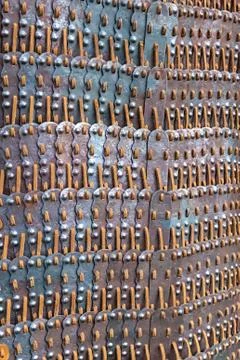 Roman warrior's chainmail pattern assembled from iron plates, human protectio Stock Photos