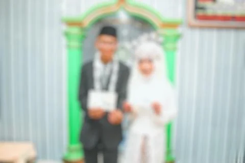 Romance and affection of a bride and groom when they get married then blurred Stock Photos