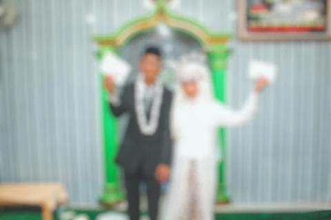 Romance and affection of a bride and groom when they get married then blurred Stock Photos
