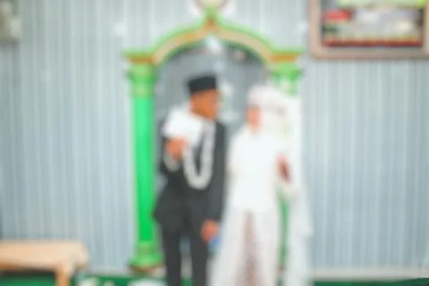 Romance and affection of a bride and groom when they get married then blurred Stock Photos