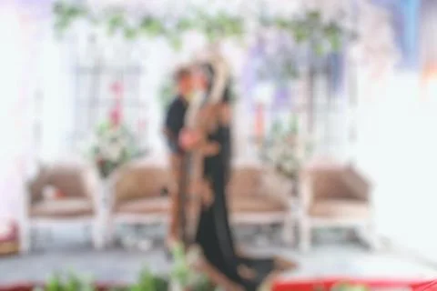 Romance and affection of a bride and groom when they get married then blurred Stock Photos