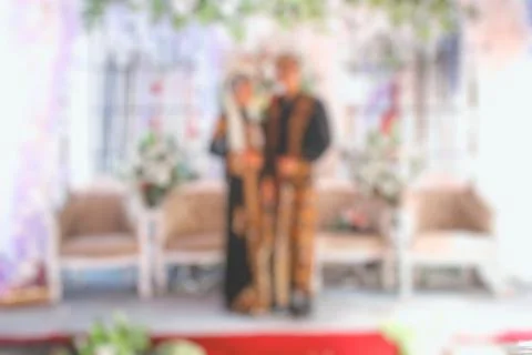 Romance and affection of a bride and groom when they get married then blurred Stock Photos