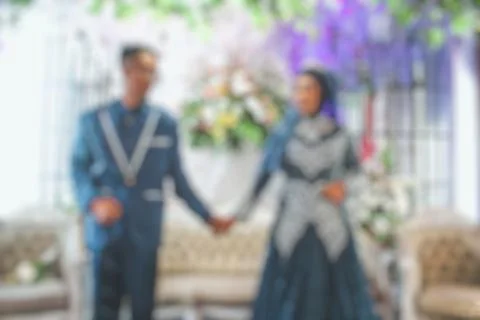 Romance and affection of a bride and groom when they get married then blurred Stock Photos