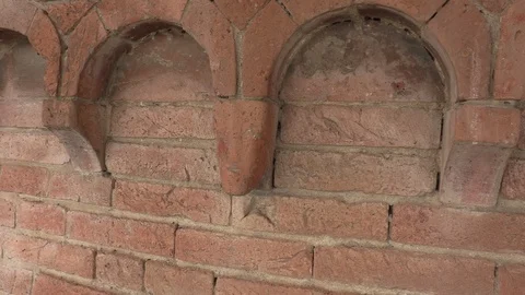 Romanesque art, brick decorations, small arches in apses. Video stock 109649567