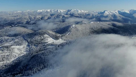 Romania freezing cold Carpathian mountains peaks with lots of snow aerial view Stock Footage 101794893