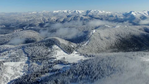 Romania freezing cold Carpathian mountains peaks with lots of snow aerial view Stock Footage 101794903