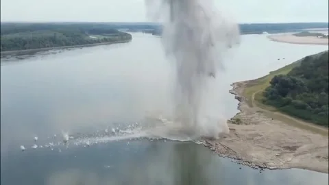Romania: Record-low Danube water levels prompt controlled blasts in Roman... Stock Footage 341323718