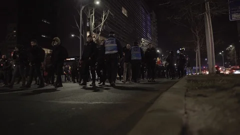 Romanian demonstrators marching and chanting slogans against Liviu Dragnea Stock Footage 104076729
