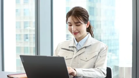 Romanian Female Factory Worker Using Laptop in Modern Office Stock-Footage 344235759