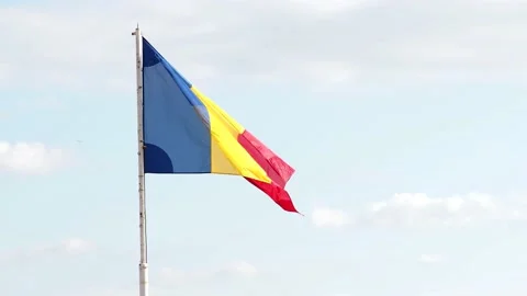 Romanian flag on the flagpole, waving in wind Stock Footage 144133151