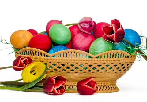Romanian traditional colored easter eggs placed in a basket Stock Photos