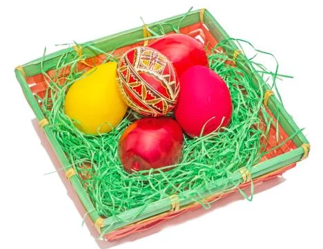 Romanian traditional colored easter eggs placed in a basket Stock-Fotos