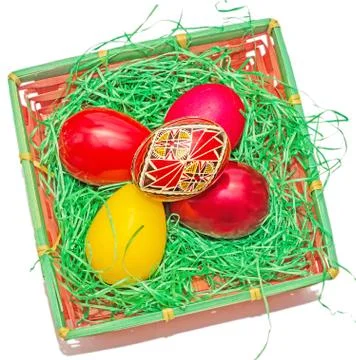Romanian traditional colored easter eggs placed in a basket Foto stock