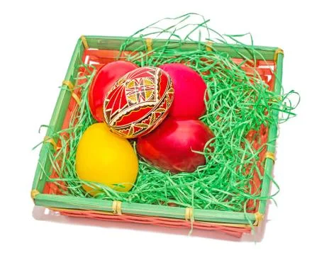 Romanian traditional colored easter eggs placed in a basket Stock-Fotos