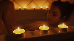 bathtub with candles in romantic atmosphere, Stock video