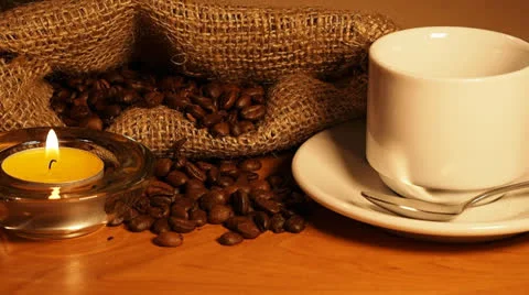 Romantic background with candles,a cup of coffee Stock Footage 23136565