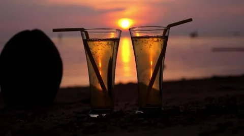 Romantic Beach Evening on Sunset with Two Glasses of Soft Drink Vidéo 45438349
