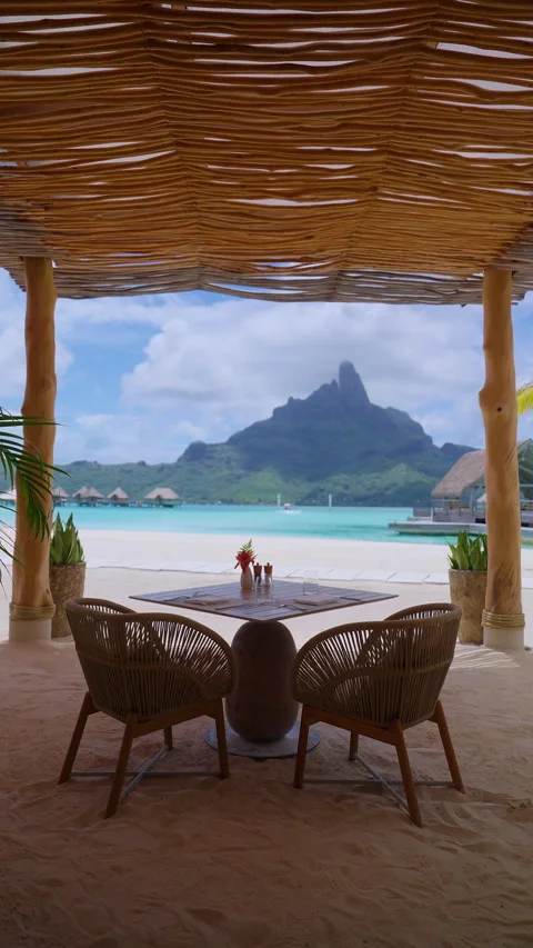 Romantic Beachside Dining Table with Mount Otemanu View in Bora Bora. Video stock 342888580