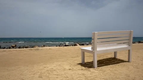 Romantic bench on the beach with a view Stock Footage 195533186