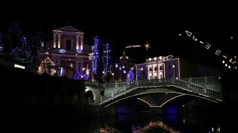 Romantic boat trip under bridges in festive Ljubljana city Stock Footage 45573345
