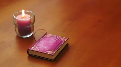 Romantic Book and Candle Stock Footage 30671994