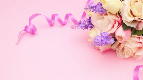 Romantic bouquet of flowers and gift appear and gift opens. Stop motion Stock Footage 137359853