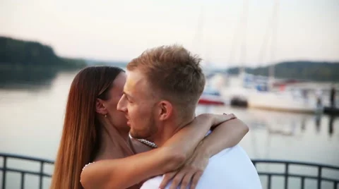 Romantic bride and groom posing outdoors Stock Footage 66877186
