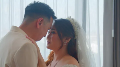 Romantic Bride and Groom Sharing Warm Hug and Deep Eye Contact Stock Footage 333375300