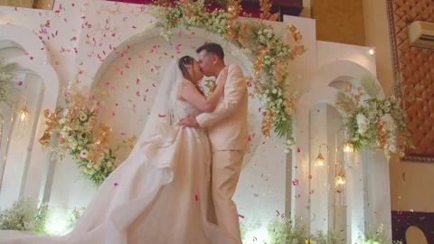 Romantic Bride and Groom Sharing a Kiss on Wedding Day Stock Footage 333379736